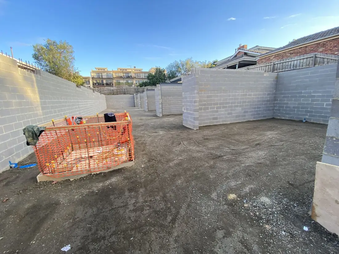 Blockwork retaining walls on a townhouse site before the slab